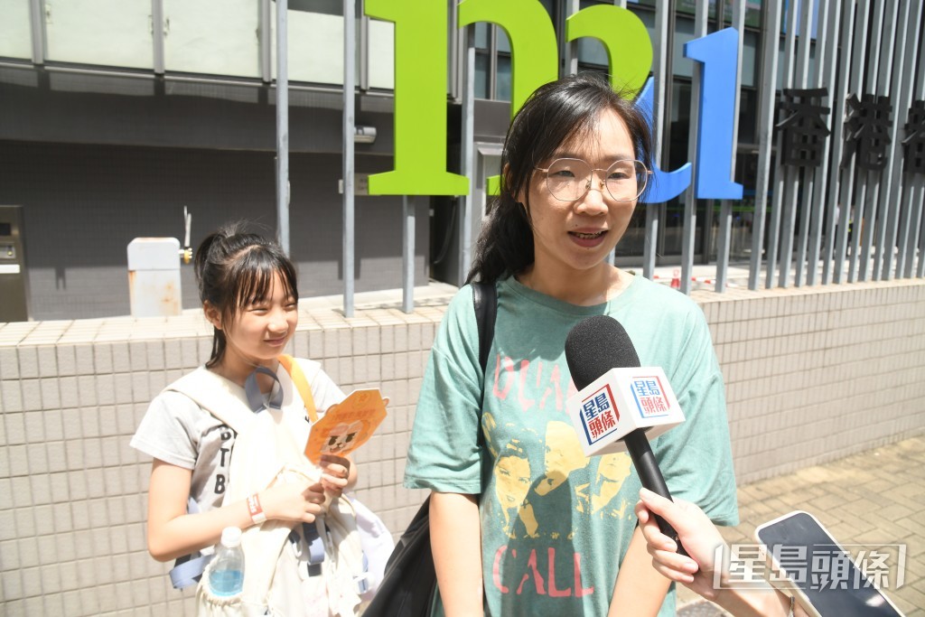 陳女士和女兒參加了交流活動，指心情很激動，體驗很好。