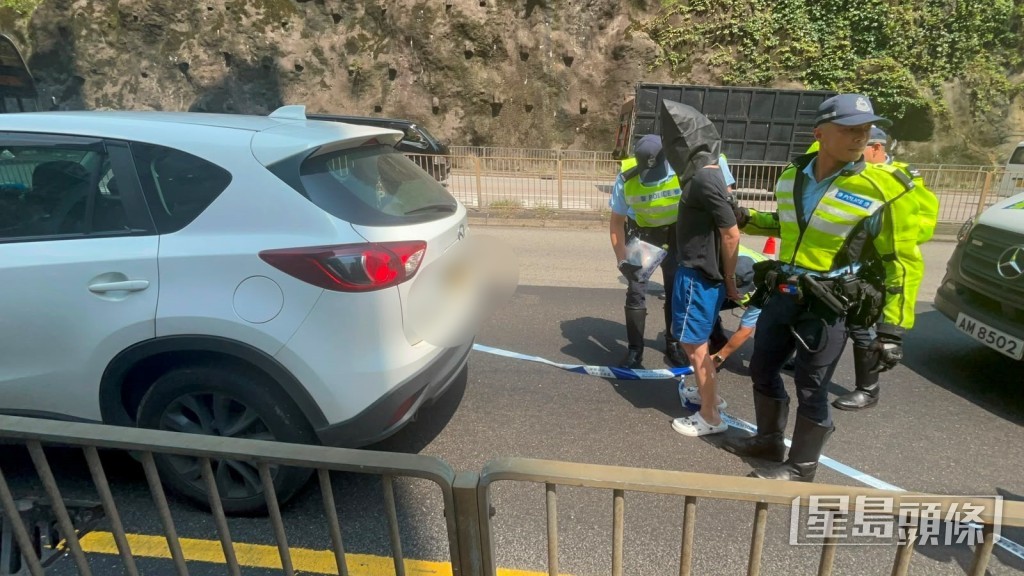 司機被捕。楊偉亨攝 司機被捕。楊偉亨攝