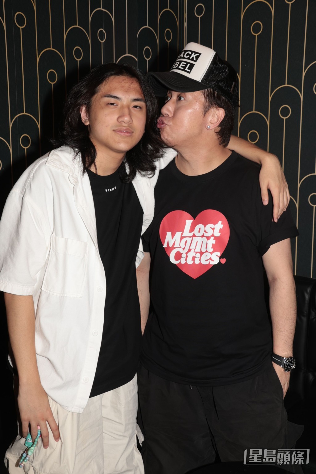 林子博為兒子移居英國。 林子博為兒子移居英國。