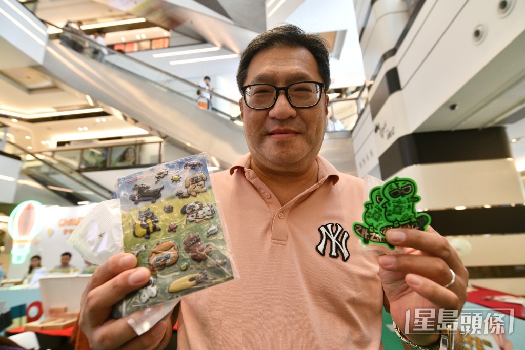 江先生認為現場氣氛熱鬧。盧江球攝 江先生認為現場氣氛熱鬧。盧江球攝