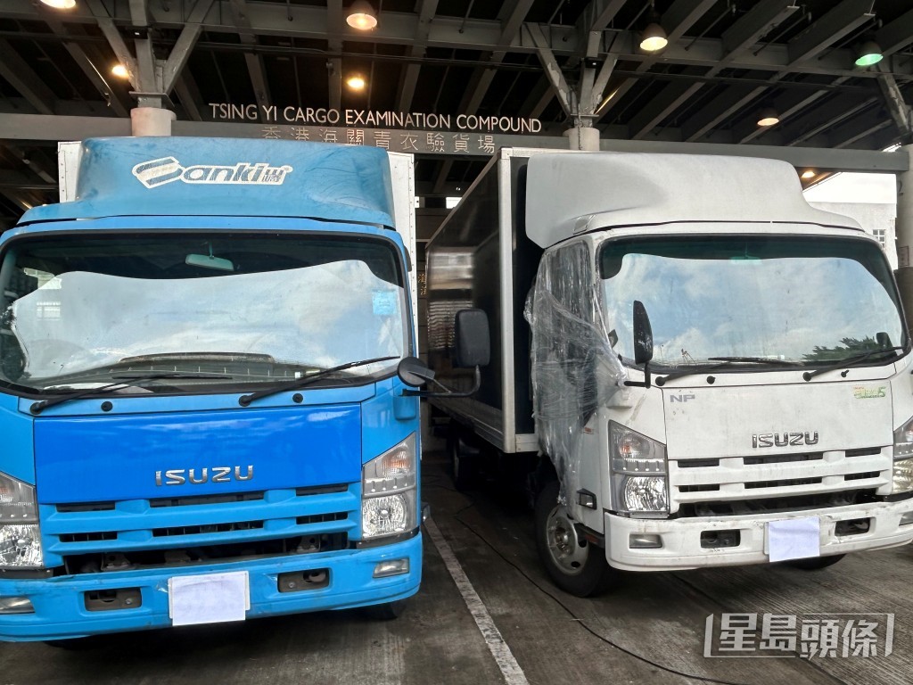 涉案兩部貨車。