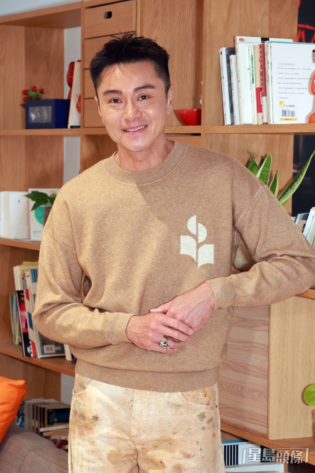 黃浩然比前開心得多。