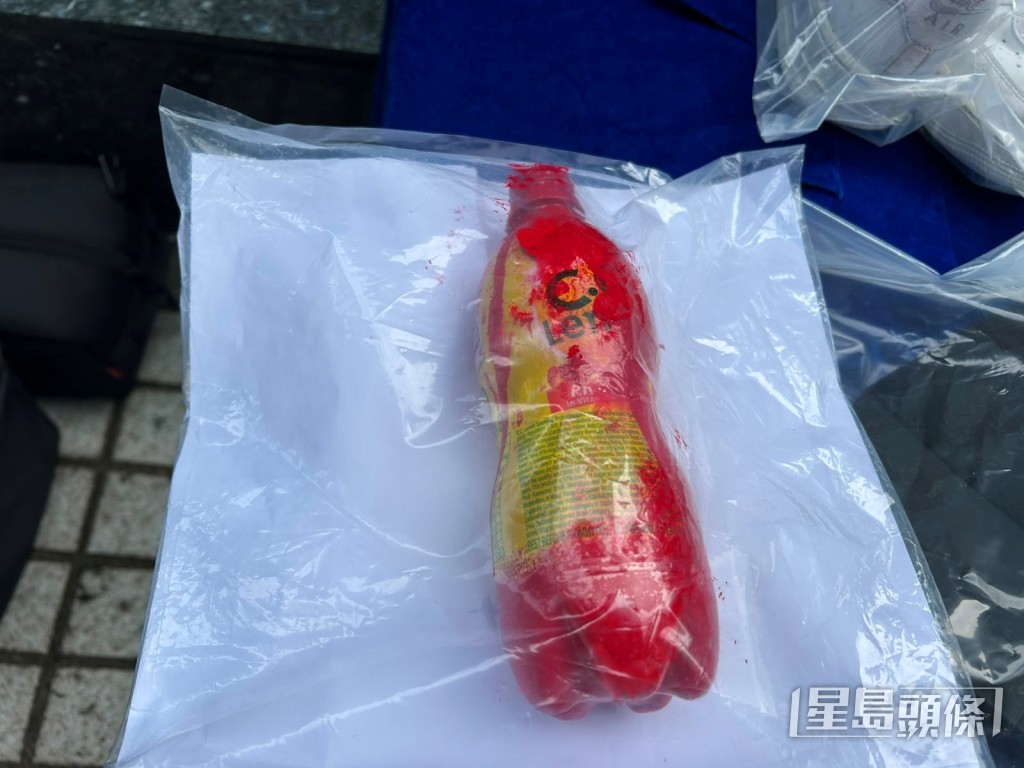 涉案紅油樽。 涉案紅油樽。