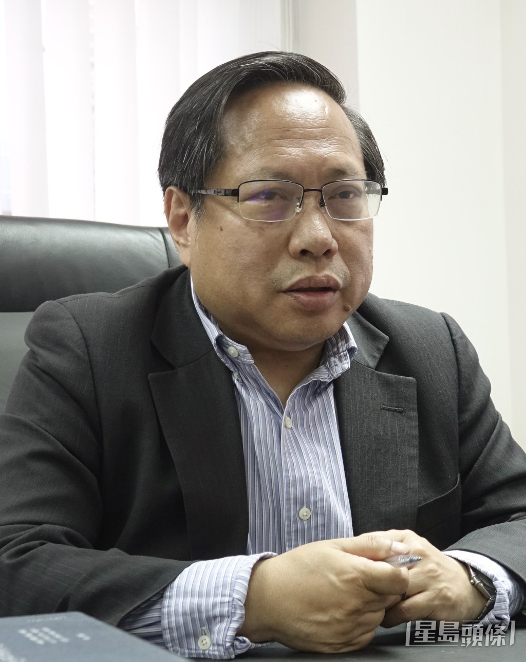 何俊仁審訊前認罪。資料圖片