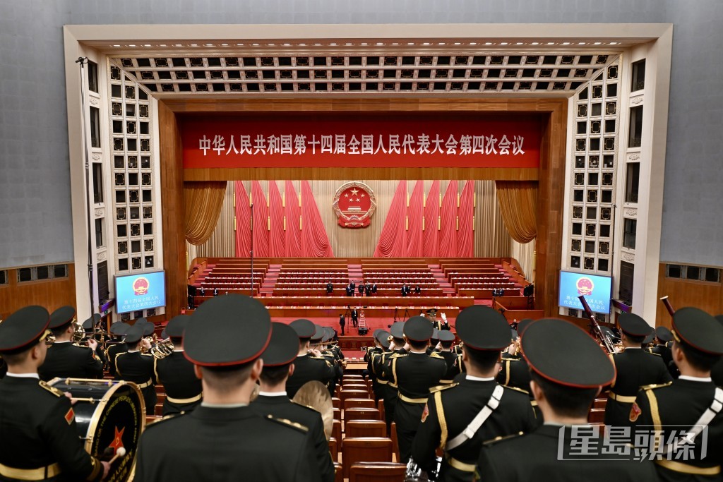 十四屆全國人大四次會議今午（12日）在北京人民大會堂閉幕。劉駿軒攝