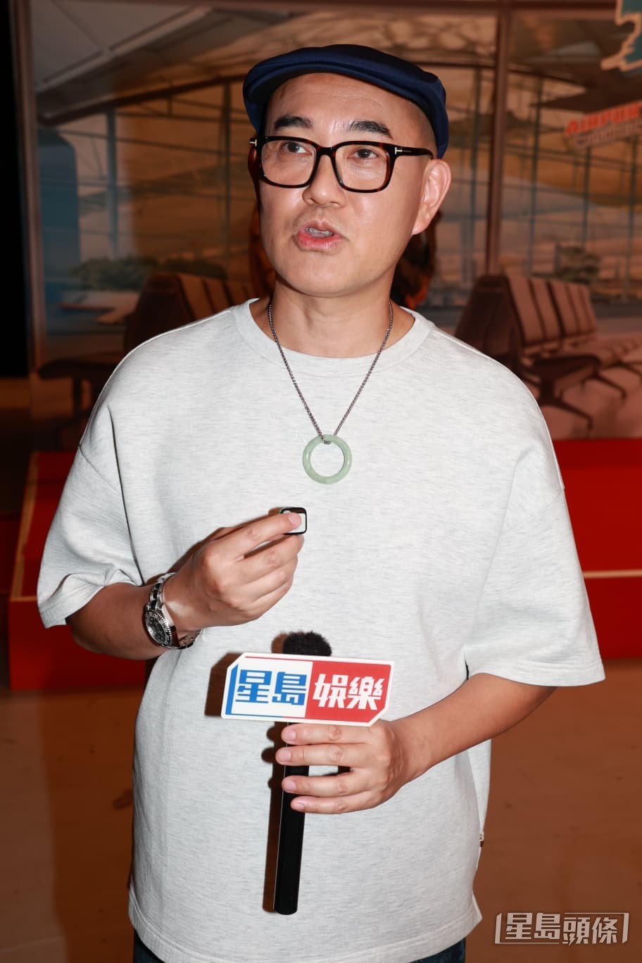 周國豐於母親離世後首現身。