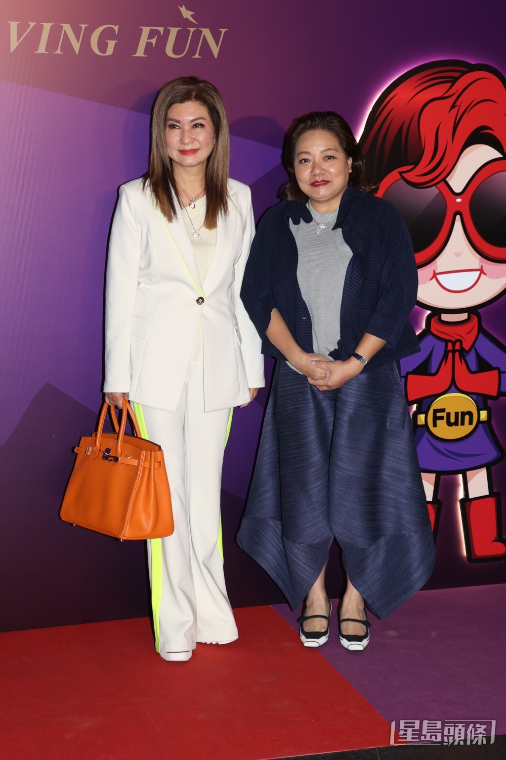 TVB高層樂易玲（左）拎橙色Hermès Birkin 30。