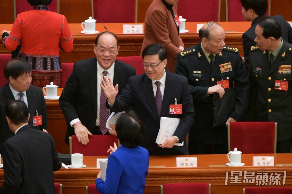 李家超列席全国人大会议开幕式。苏正谦摄