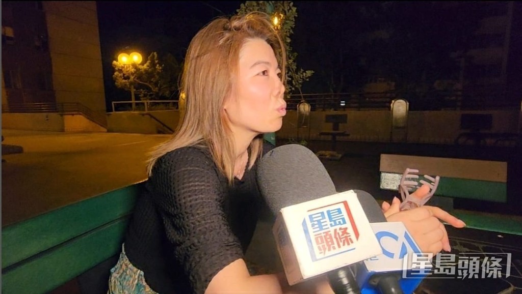寇小姐因停電無法入睡,與姐姐步行17層落樓乘涼聊天,打發時間。黎志偉攝 寇小姐因停電無法入睡,與姐姐步行17層落樓乘涼聊天,打發時間。黎志偉攝