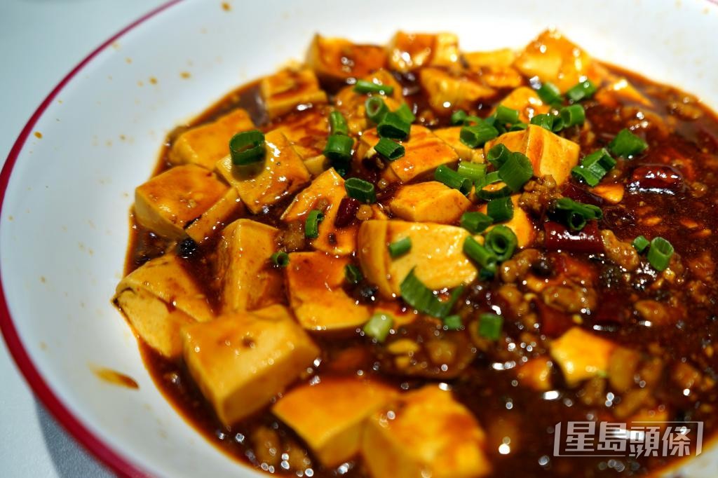 炒菜機械人輕鬆炒出一碟麻婆豆腐。 炒菜機械人輕鬆炒出一碟麻婆豆腐。