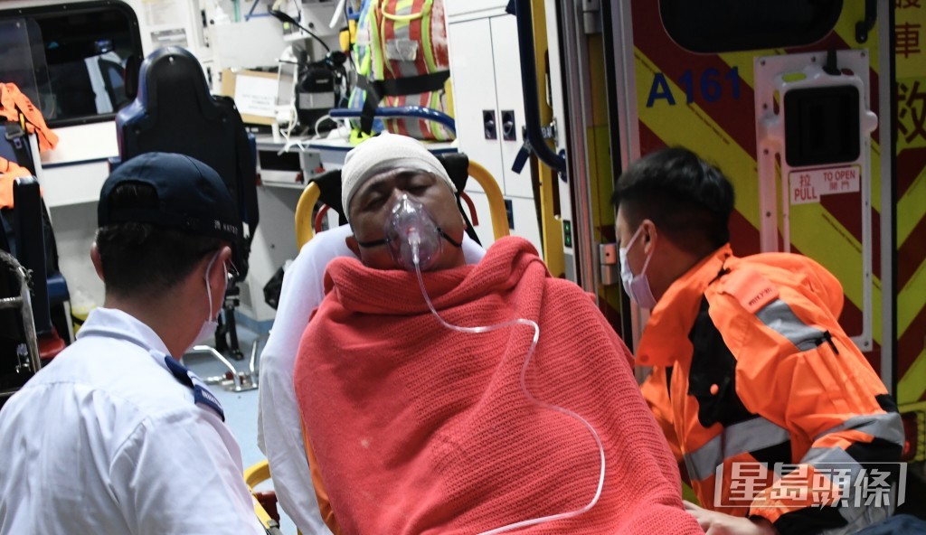 工人頭傷清醒送院。楊偉亨攝