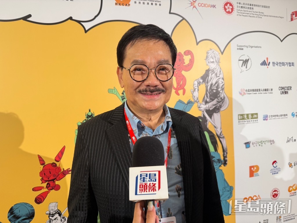 國際漫畫家大會香港委員會代表黃玉郎。