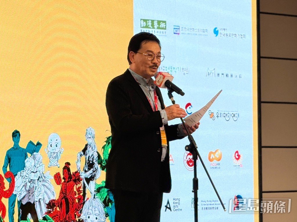 國際漫畫家大會香港委員會代表黃玉郎。