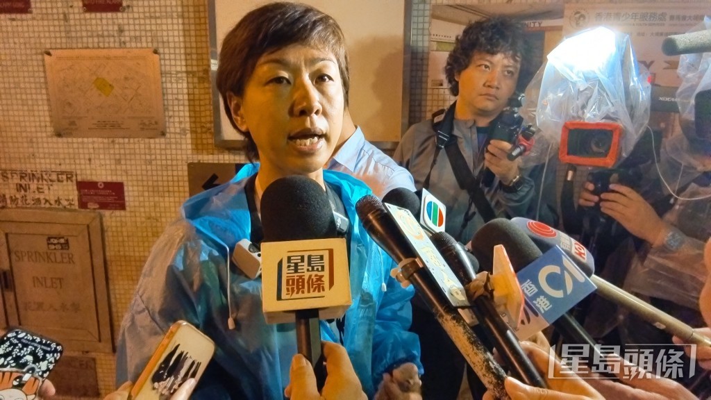 宏昌閣居民羅小姐在大火中失去母親。黃文威攝