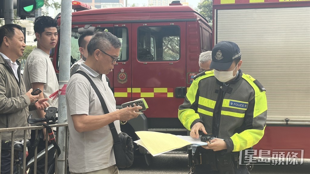 圖左男子為林寶堅尼司機。劉漢權攝