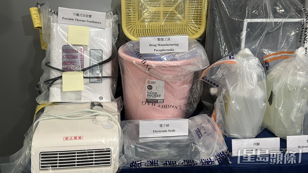 单位内亦检获常见制毒工具包括电磁炉、煲、可携式浴室宝及电子磅等。刘汉权摄