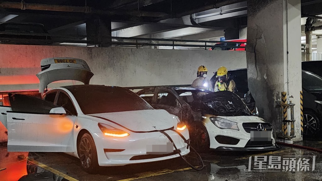 在旁的私家車被波及。黎志偉攝 在旁的私家車被波及。黎志偉攝