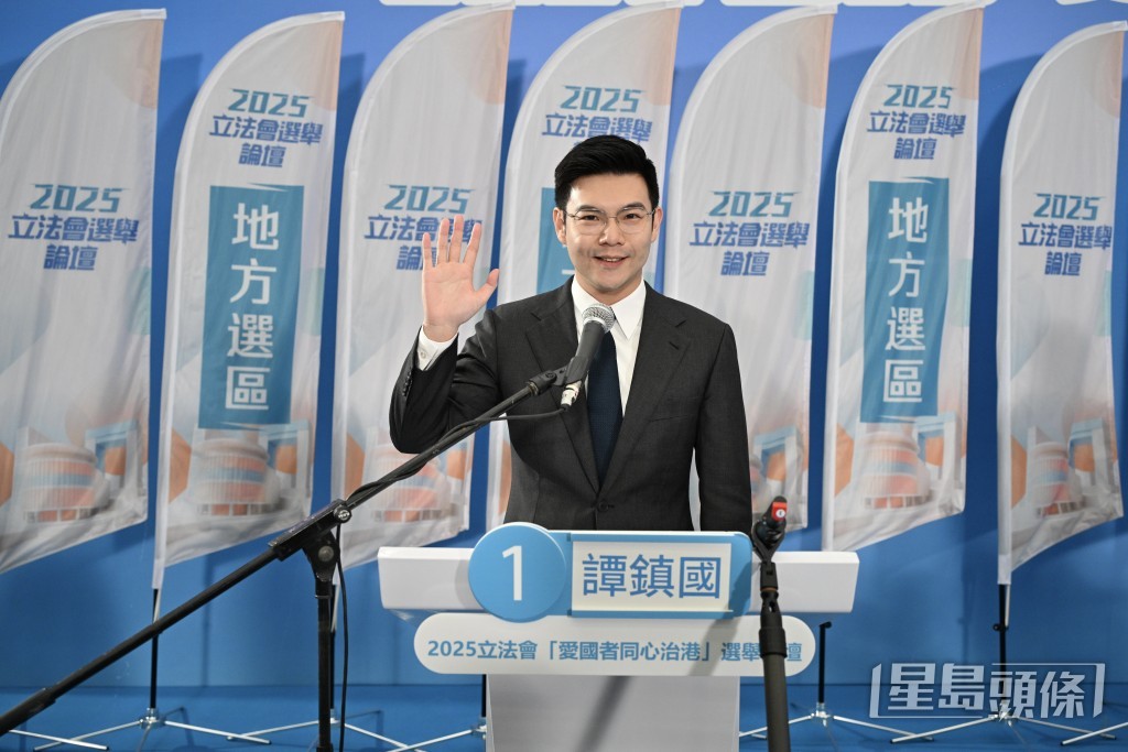 新社聯譚鎮國。