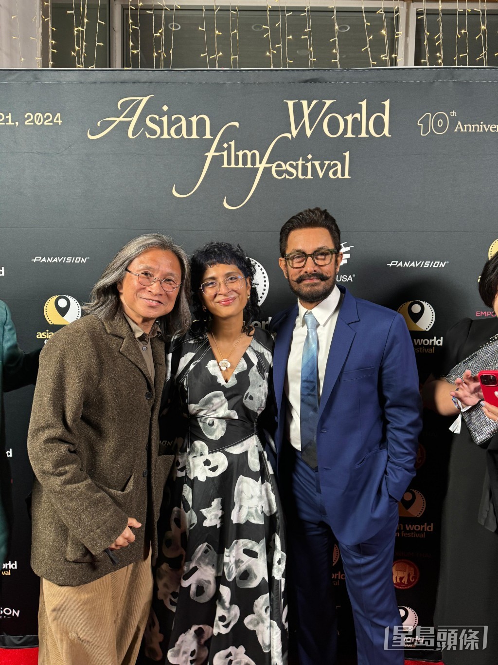 陳可辛在頒獎禮上，與阿米爾汗前妻Kiran Rao（中）及印度知名演員阿米爾汗（右）合照。