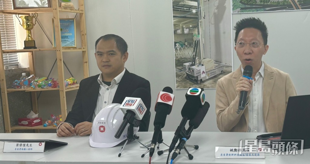 房屋署结构工程师梁伟恺（左）。郭颖彤摄