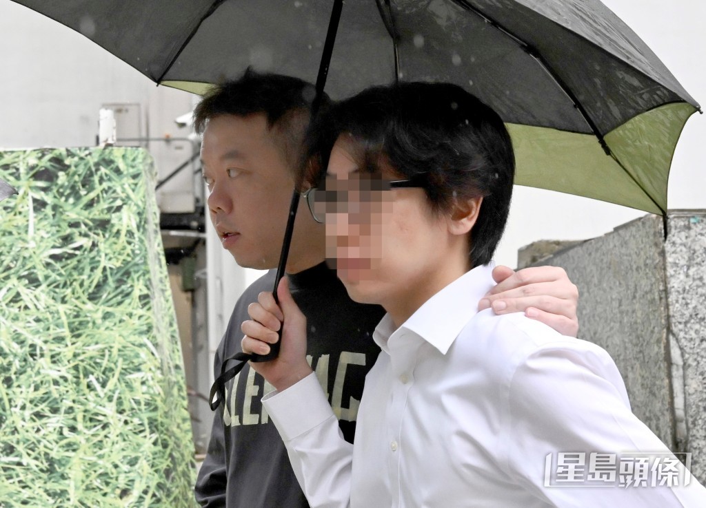 被告之一梁仲彝（左）。劉駿軒攝