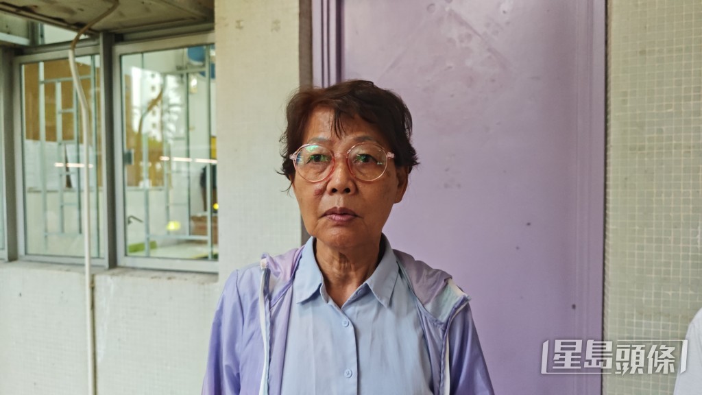 業主立案法團主席周女士指女死者獨居起火單位內。 業主立案法團主席周女士指女死者獨居起火單位內。