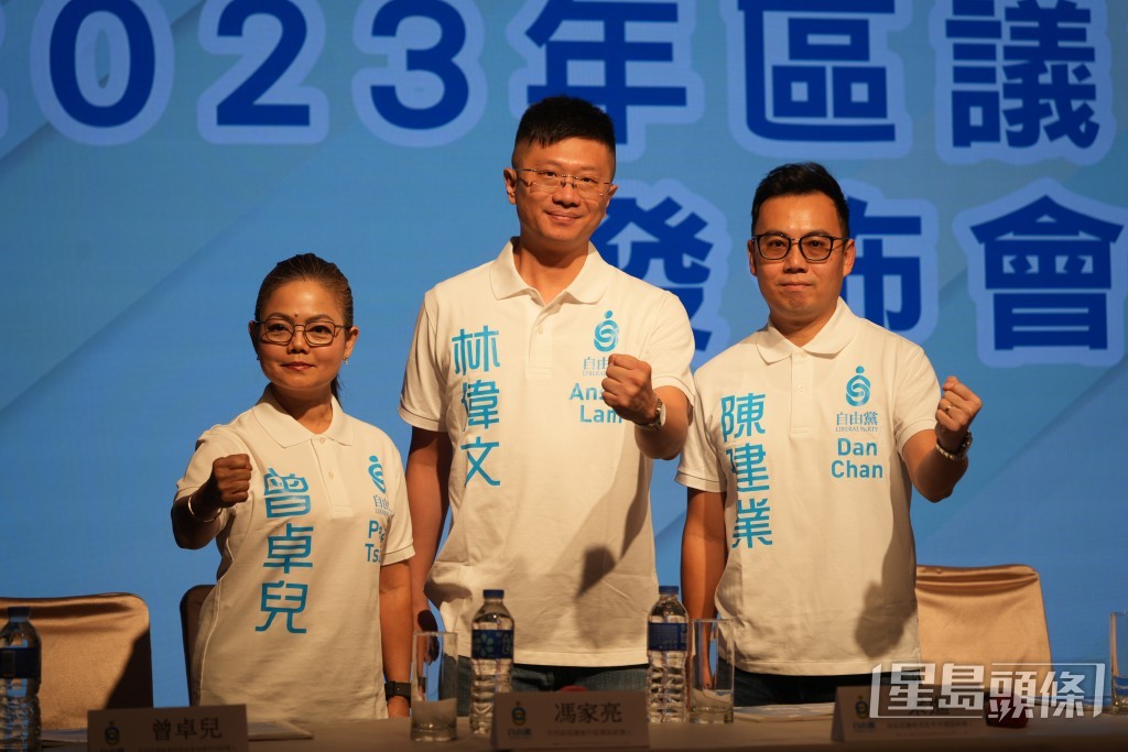 參選「三會」間選的3人，包括陳建業（右）、林偉文（中）及曾卓兒（左）。吳豔玲攝