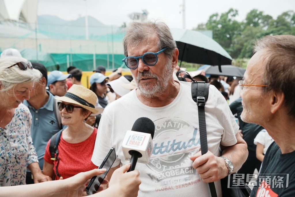法國遊客羅拔表示,很高興能來港感受不一樣的文化和食物。汪旭峰攝 法國遊客羅拔表示,很高興能來港感受不一樣的文化和食物。汪旭峰攝