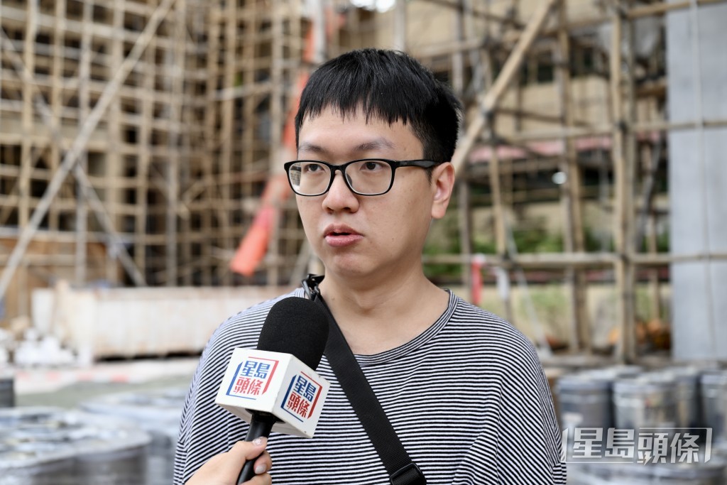 今年初購入單位自住的業主周先生。