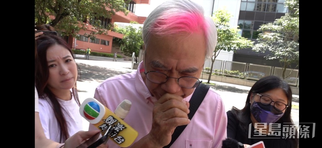 李龍基情緒激動。 李龍基情緒激動。