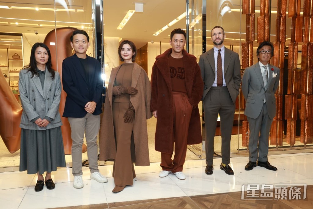 兩人現身時裝品牌店開幕。