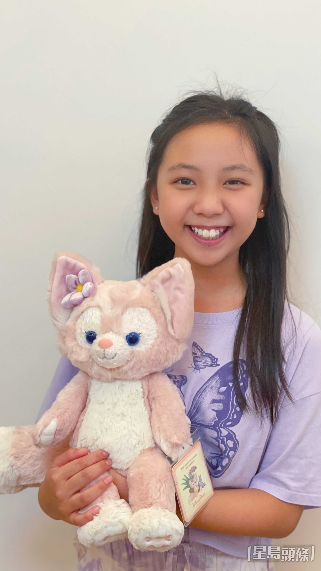 朱凱婷女兒小時候有甜美笑容。