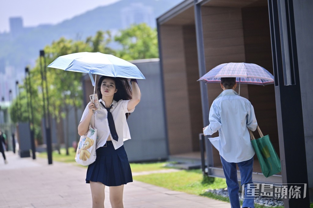 沙田、屯门、启德、跑马地均逾35°C。陈极彰摄