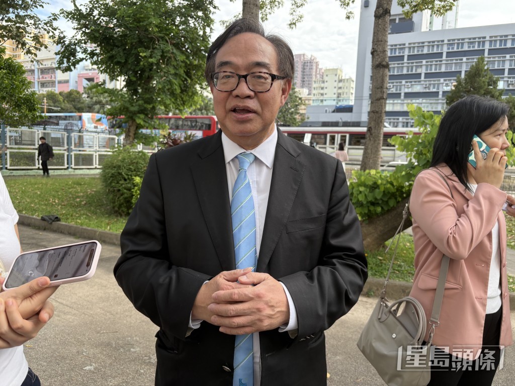 經民聯主席盧偉國現身支持譚鎮國。黃子龍攝