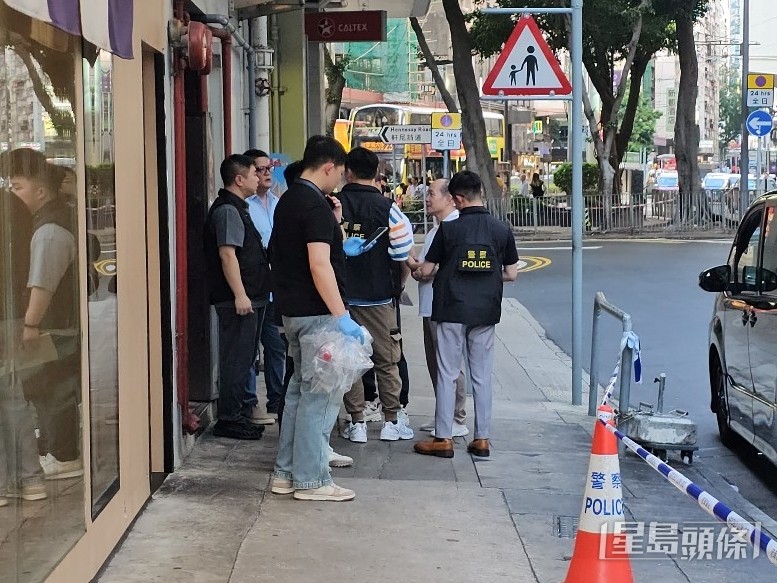 大批警員在場調查。黃文威攝 大批警員在場調查。黃文威攝