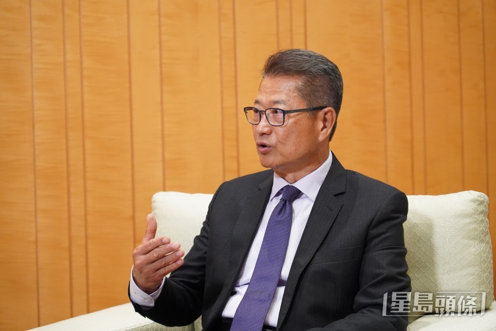 陳茂波形容金融是「無硝煙的戰場」。葉偉豪攝