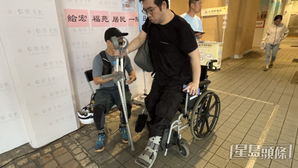 郭先生左腳骨折要用拐杖及保護夾。