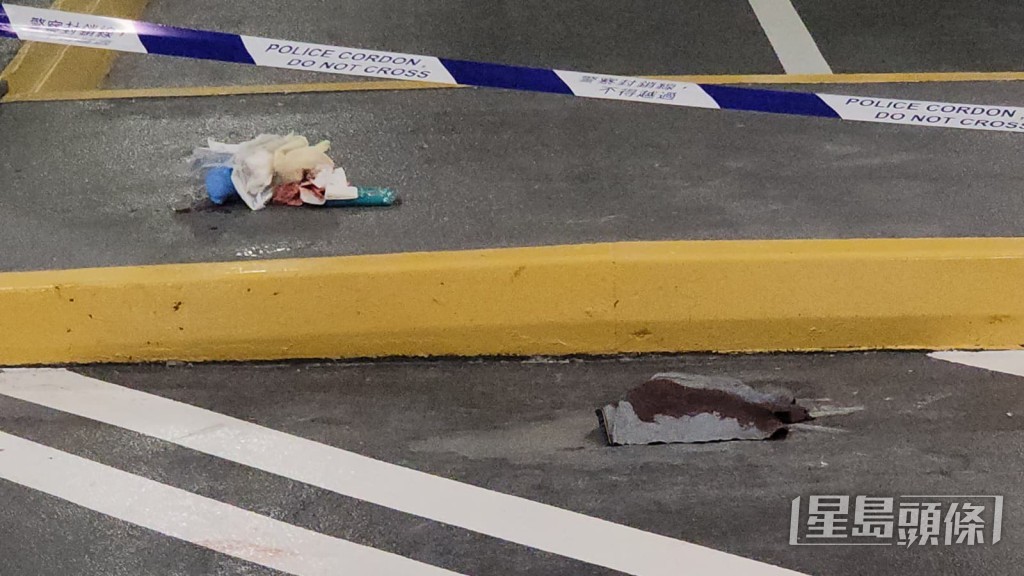 現場遺下一灘血迹。黎志偉攝 現場遺下一灘血迹。黎志偉攝