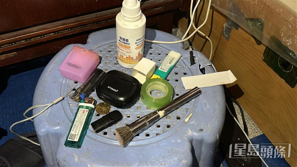 床邊的凳仔放有吸食太空油的煙彈。楊偉亨攝