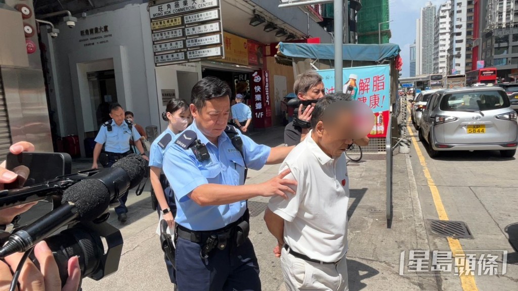 另外一名涉案內地男子被捕帶署調查。蔡楚輝攝 另外一名涉案內地男子被捕帶署調查。蔡楚輝攝