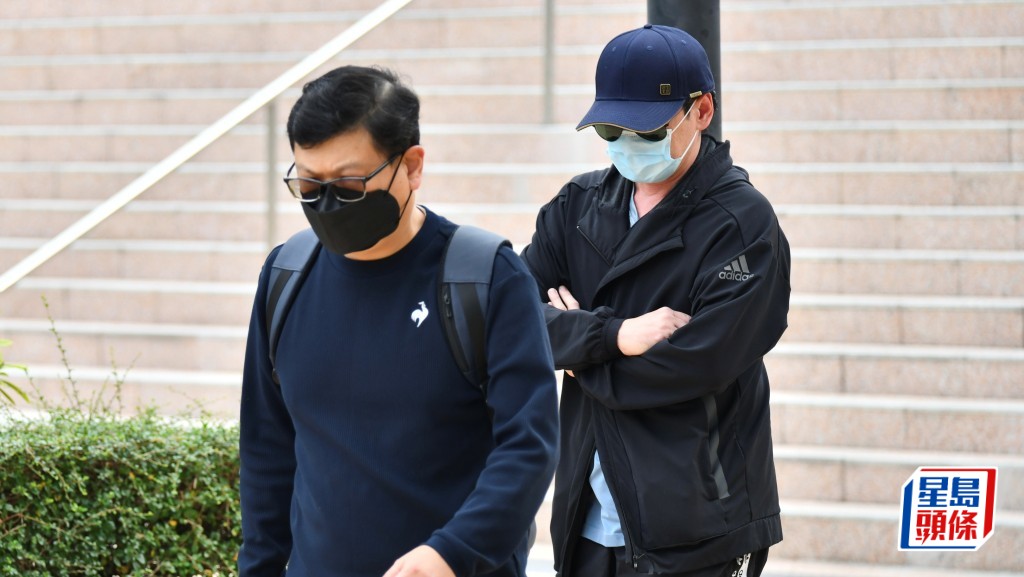 左起被告杨启光及陈永坚。卢江球摄