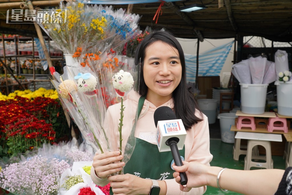 花檔老闆李小姐希望生意比去年增加1-2成。葉偉豪攝