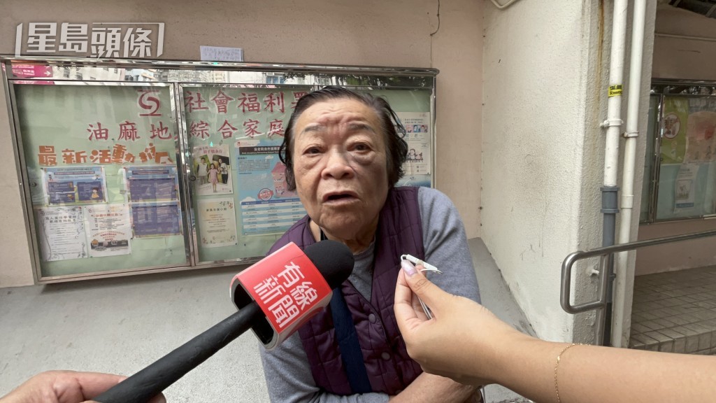 住七楼的邱婆婆知悉邻居遇难，庆幸自己无恙。林思明摄