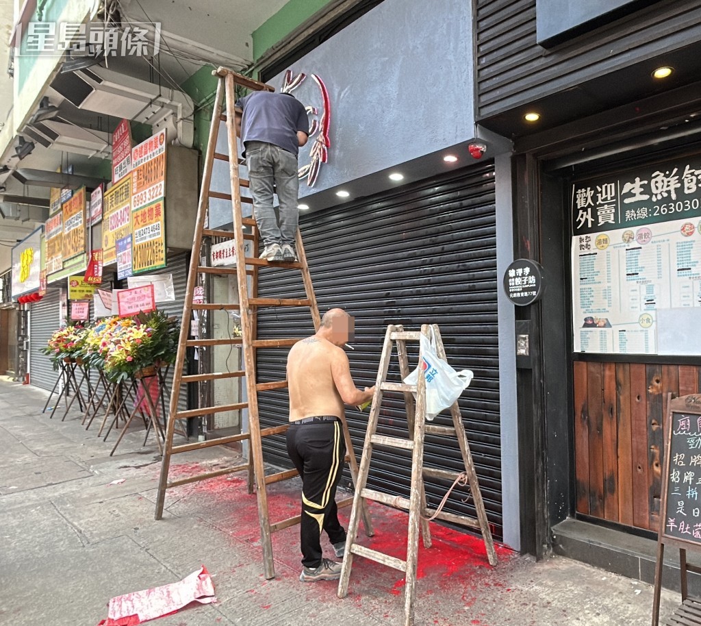 工人清理油漆。林思明攝 工人清理油漆。林思明攝