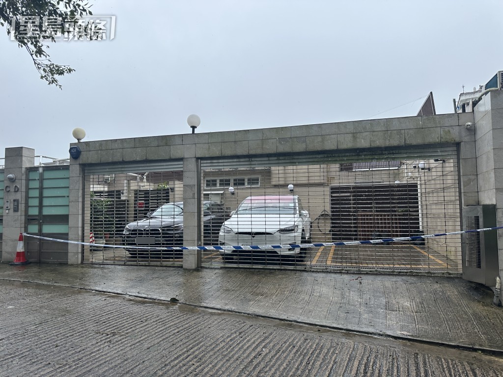 警方在大屋拉起封锁线。梁国峰摄