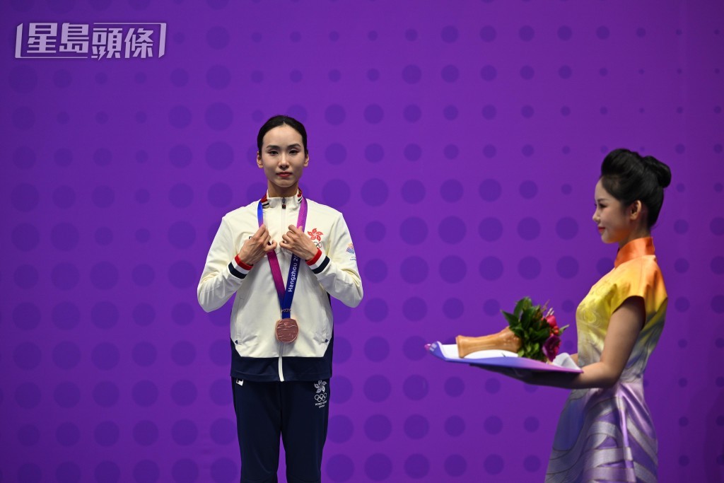 武術港將陳穗津完成太極拳、太極劍全能項目,摘走一面銅牌 陳極彰攝 武術港將陳穗津完成太極拳、太極劍全能項目,摘走一面銅牌 陳極彰攝