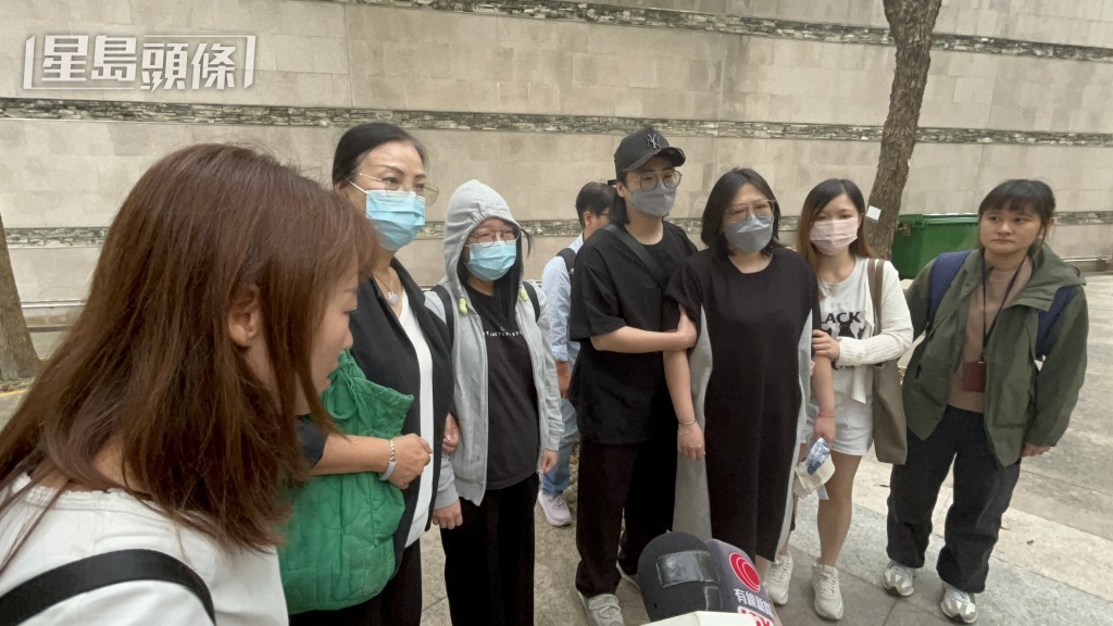 兩死者的家屬到殮房認屍。楊偉亨攝 兩死者的家屬到殮房認屍。楊偉亨攝