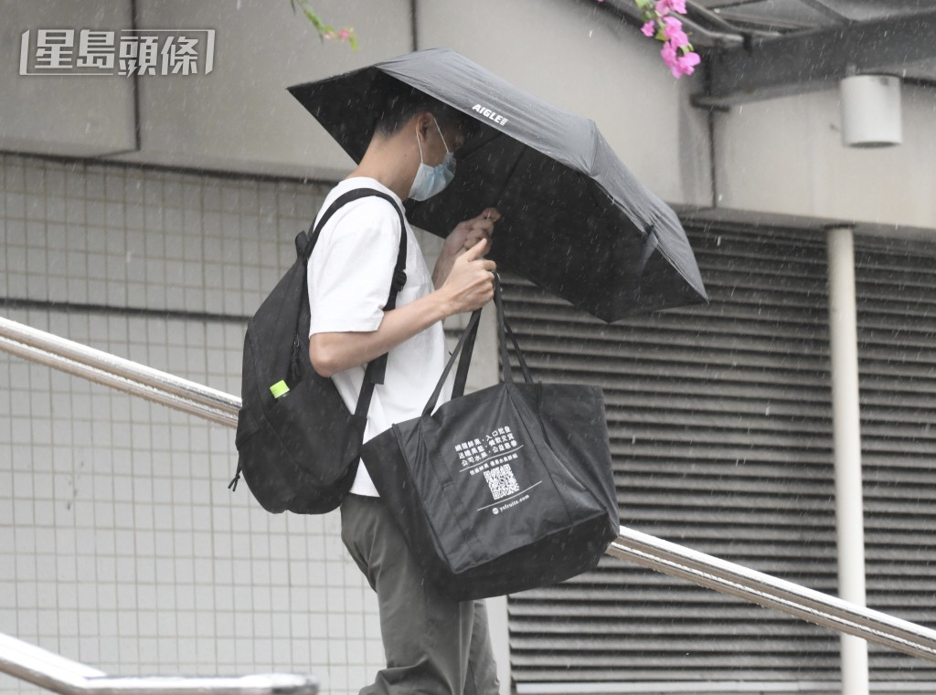 当日乔装参加活动的一级衞生督察许汉森（音译）。何君健摄