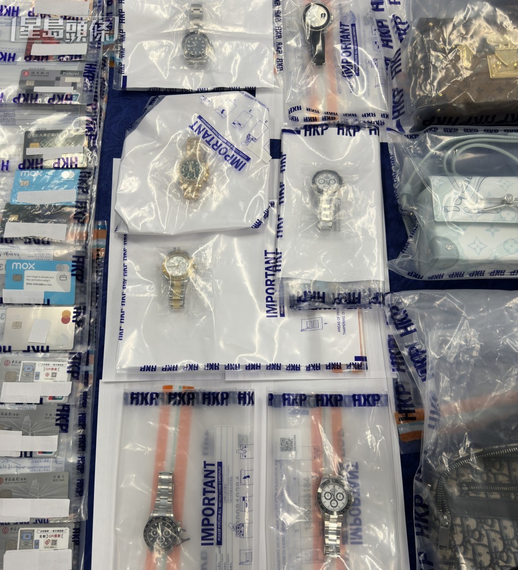 案中警方檢獲多隻名錶,為非法放債集團的犯罪得益。梁國峰攝 案中警方檢獲多隻名錶,為非法放債集團的犯罪得益。梁國峰攝