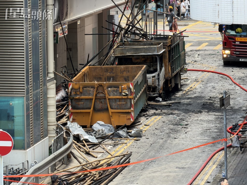 環保斗被火舌波及。 環保斗被火舌波及。